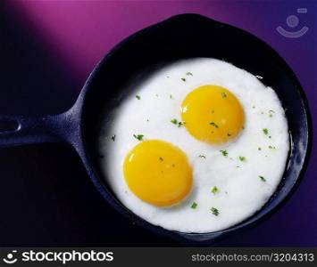 Close-up of eggs frying in a pan