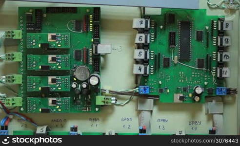 Close up of electronic circuit board of fire alarm system.