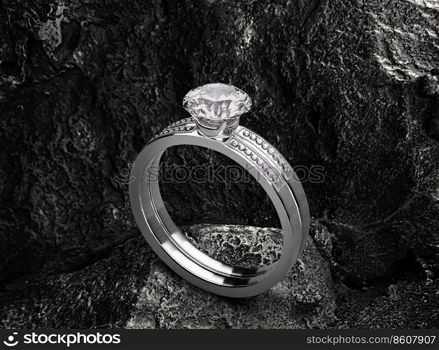 Close up of elegant diamond ring on black coal background