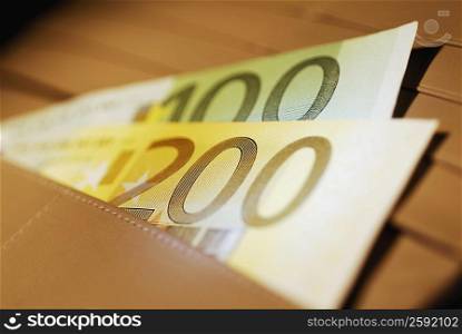 Close-up of Euro banknotes in a wallet