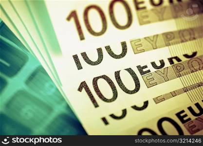 Close-up of European union banknotes and a calculator