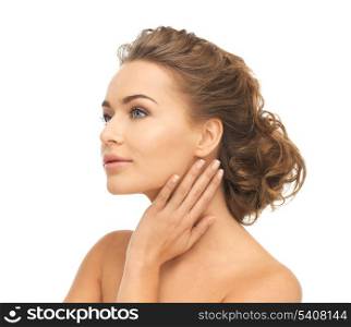 close up of face and hands of beautiful woman