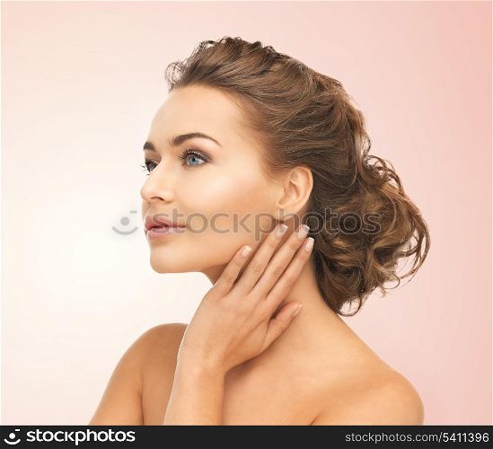 close up of face and hands of beautiful woman
