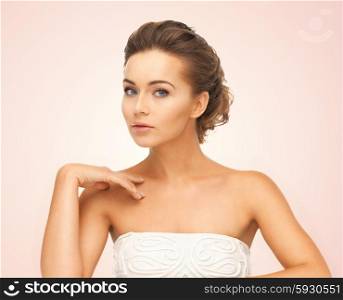 close up of face and hands of beautiful young woman. beautiful woman