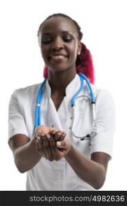 Close up of female african doctor holding something in hands