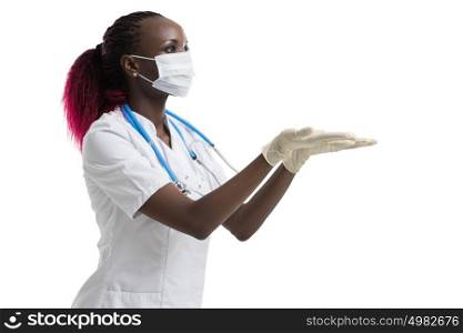 Close up of female african doctor holding something in hands