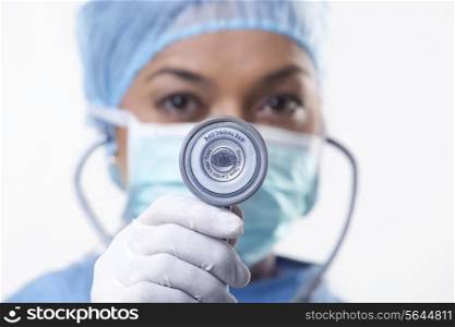 Close-up of female doctor holding stethoscope