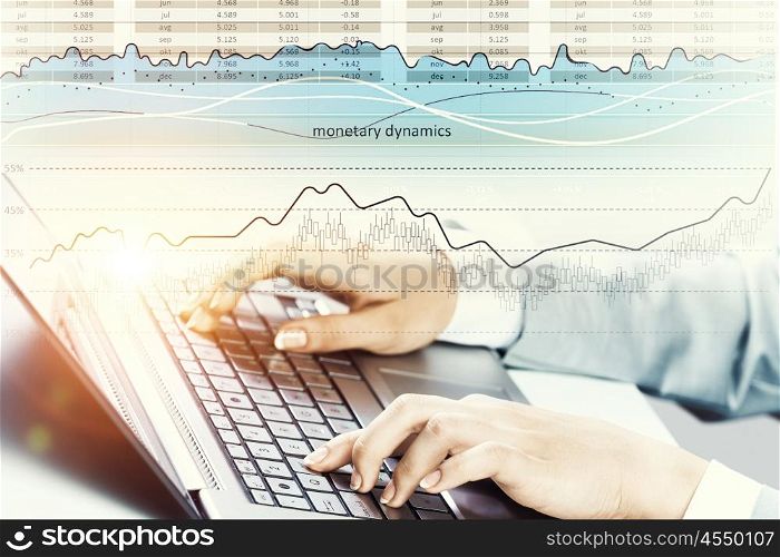 Close up of female hands working on computer keyboard. Woman typing on keyboard