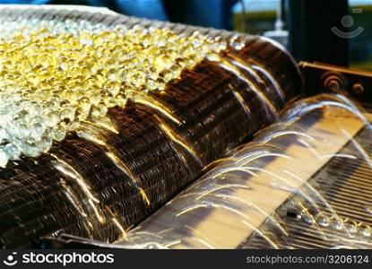 Close-up of fiberglass on a conveyor belt in a factory