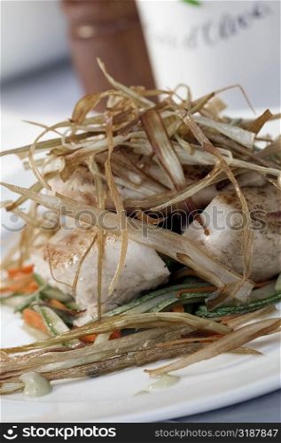 Close-up of fish fillets in a plate