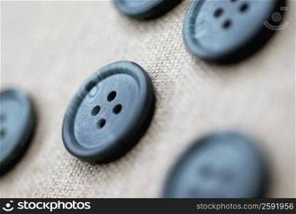 Close-up of five buttons