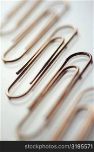 Close-up of five paper clips