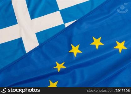 Close up of flags of European Union and Greece