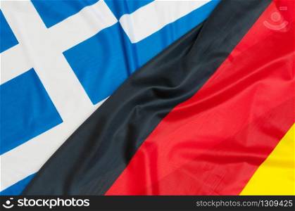 Close up of flags of Germany and Greece