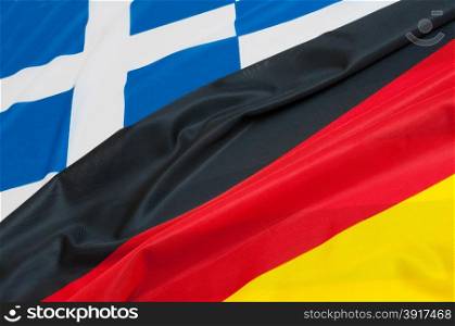Close up of flags of Germany and Greece