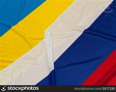 Close up of flags of Ukraine and Russia