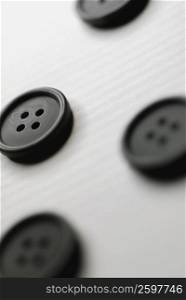 Close-up of four buttons