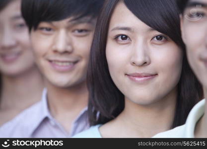 Close Up of Four Young People Standing in a Row in Beijing