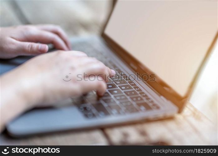 Close-up of freelance people businessfemale casual working with laptop computer and smartphone,coffee cup in coffee shop like,communication concept