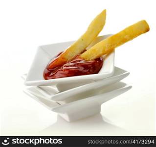 Close Up Of French Fries And Ketchup On White Background