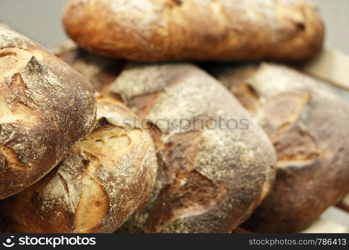 Close up of fresh baked rustic bread. Shallow focus.