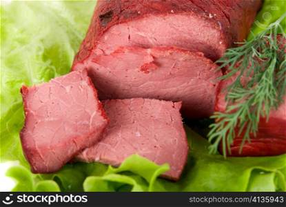 Close up of fresh lettuce and beef meat isolated on white