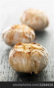 Close up of fresh roasted garlic bulbs