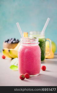 Close-up of fresh smoothie with fruits and berries, selective focus. Detox, dieting, clean eating, vegetarian, vegan, fitness, healthy lifestyle concept