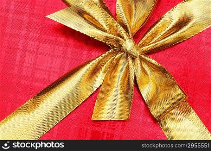 Close up of gift boxes with golden ribbons
