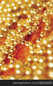 Close-up of golden beads