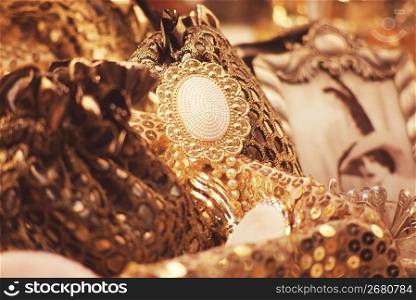 close up of golden brooch