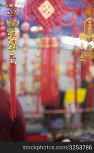 Close-up of good luck charms at a market stall