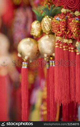 Close-up of good luck charms in a market stall