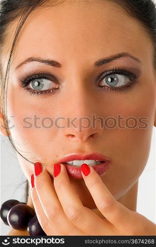 close up of graceful girl with stunning eyes fashion make up and wisp on her face