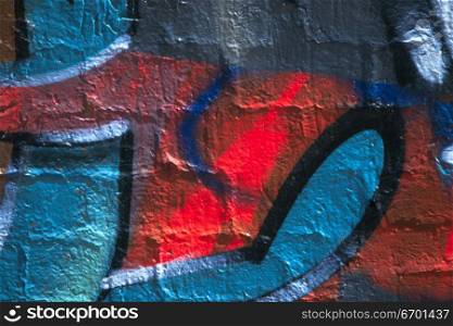 Close-up of graffiti on a brick wall