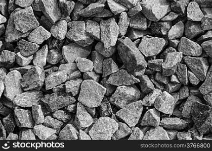 Close up of gray gravel background, black and white