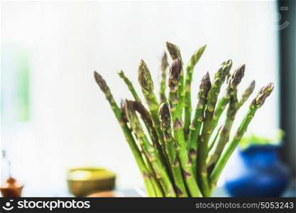 Close up of green asparagus bunch, front view