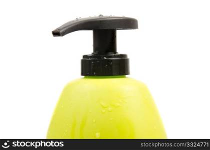 Close up of green shampoo bottle cap. Isolated on white background