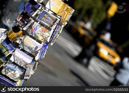 Close-up of greeting cards on a metal stand, Manhattan, New York City, New York State, USA
