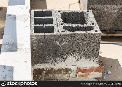 Close up of grey airbrick with holes. Industrial construction site objects concept.. Close up of airbricks