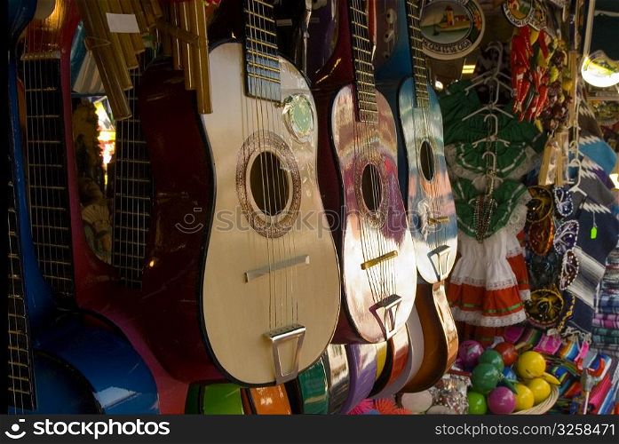 Close-up of guitars in a store