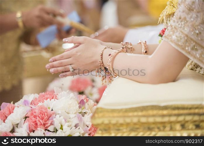 Close up of Hand bride in Thai wedding ceremony