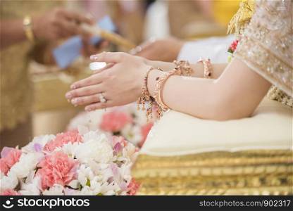 Close up of Hand bride in Thai wedding ceremony