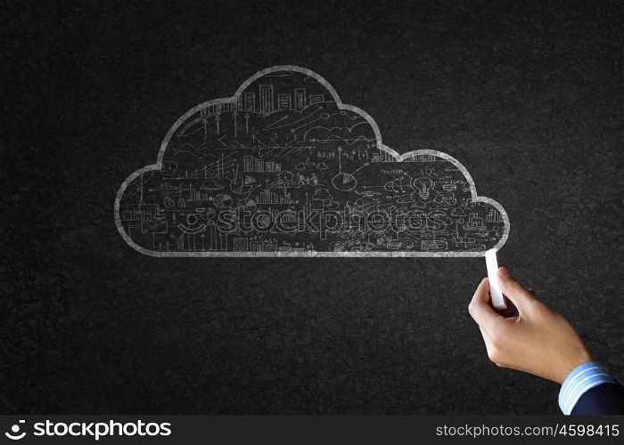 Close up of hand drawing cloud computing concept with chalk. Computing concept