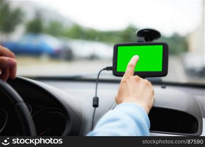 Close-Up of Hand of the Female Driver, Looking for a Way to Navigator in the Road - Green Screen