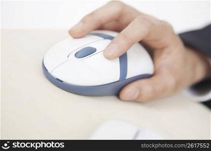Close up of hand on computer mouse