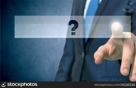 Close up of hand touching question mark icon with finger. Question icon