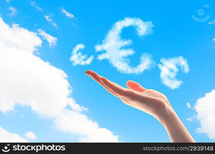 Close up of hand with euro signs