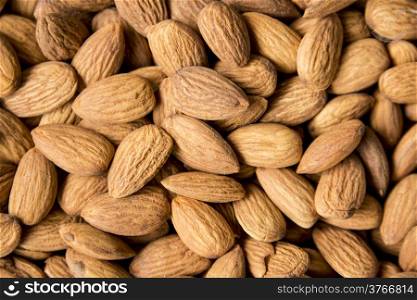 Close up of healthy almond nuts. Prunus Amygdala