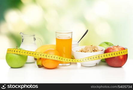 close up of healthy breakfast and measuring tape